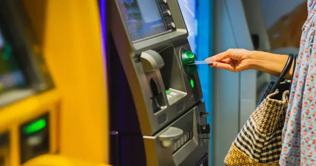 tarik tunai di atm merchant singapore